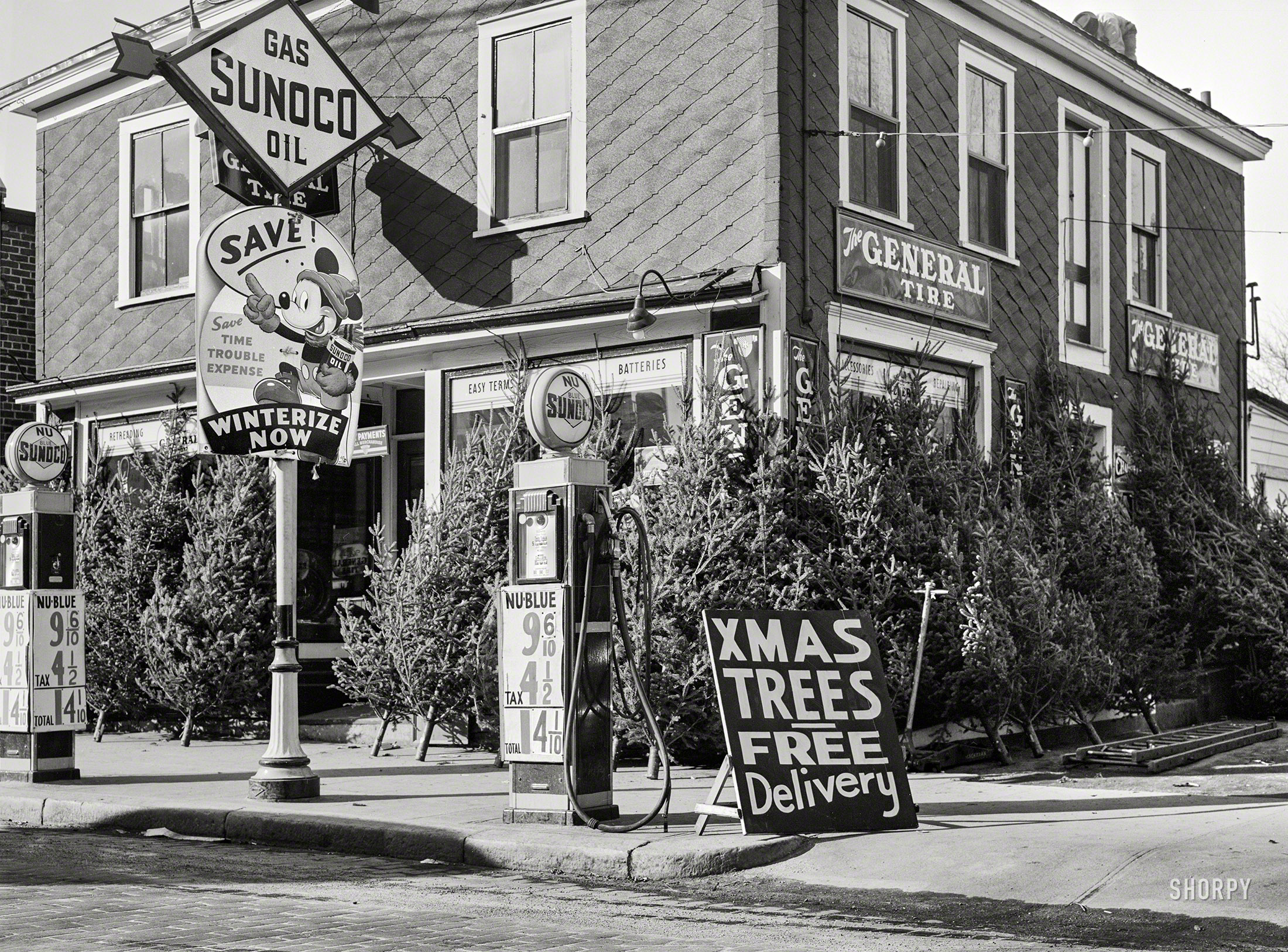 1940 December Christmas trees for sale at a gas station Woonsocket, Rhode Island.jpg