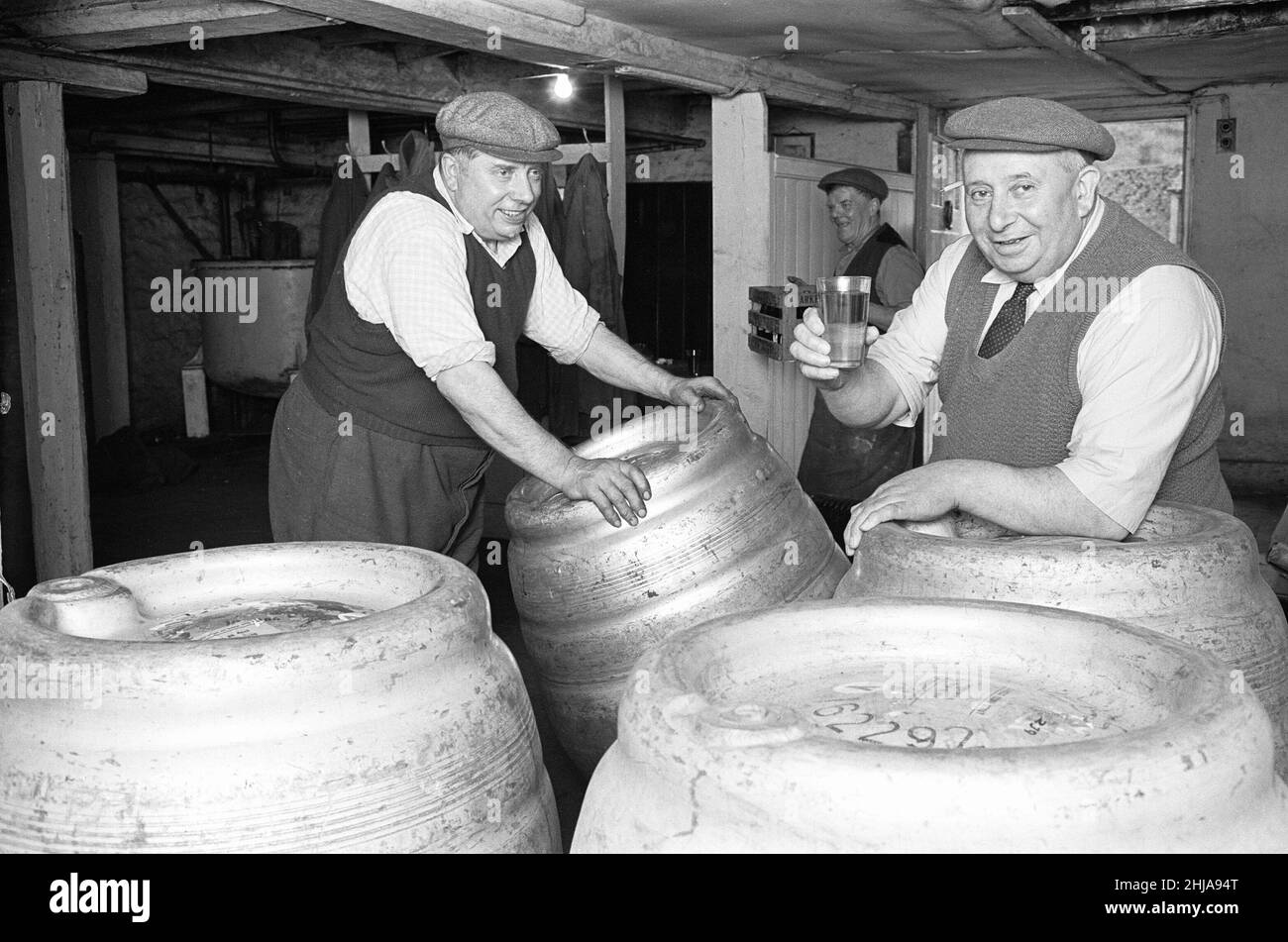 a-drayman-samples-the-beer-during-a-break-in-work-at-the-donnington-brewery-5th-july-1963-2HJA...jpg
