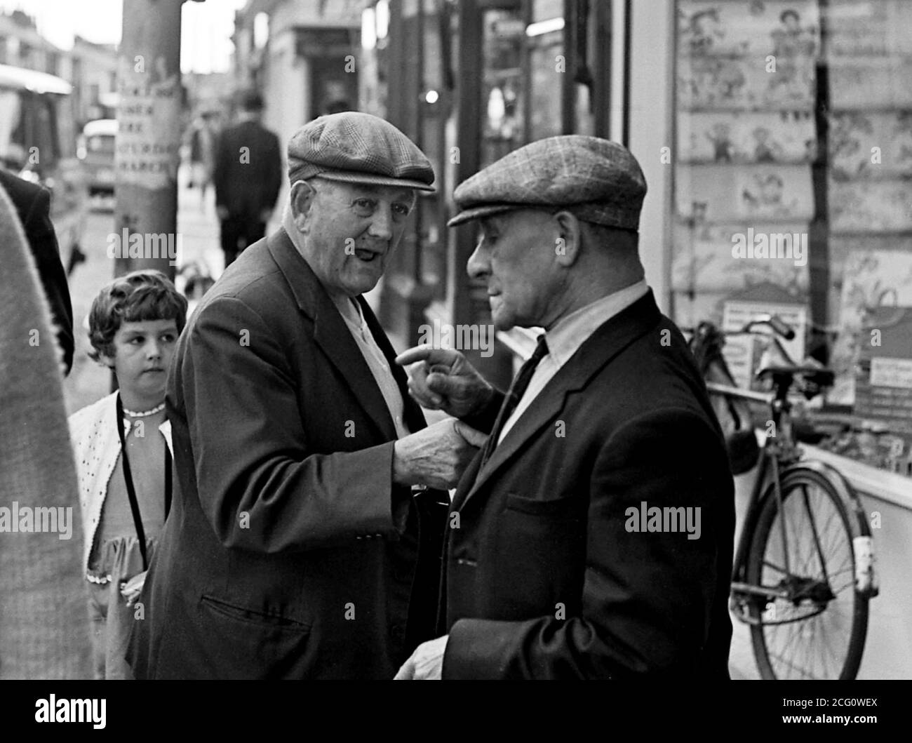ajaxnetphoto-1968-portsmouth-england-finger-pointing-two-older-gentlemen-exchange-views-on-lak...jpg