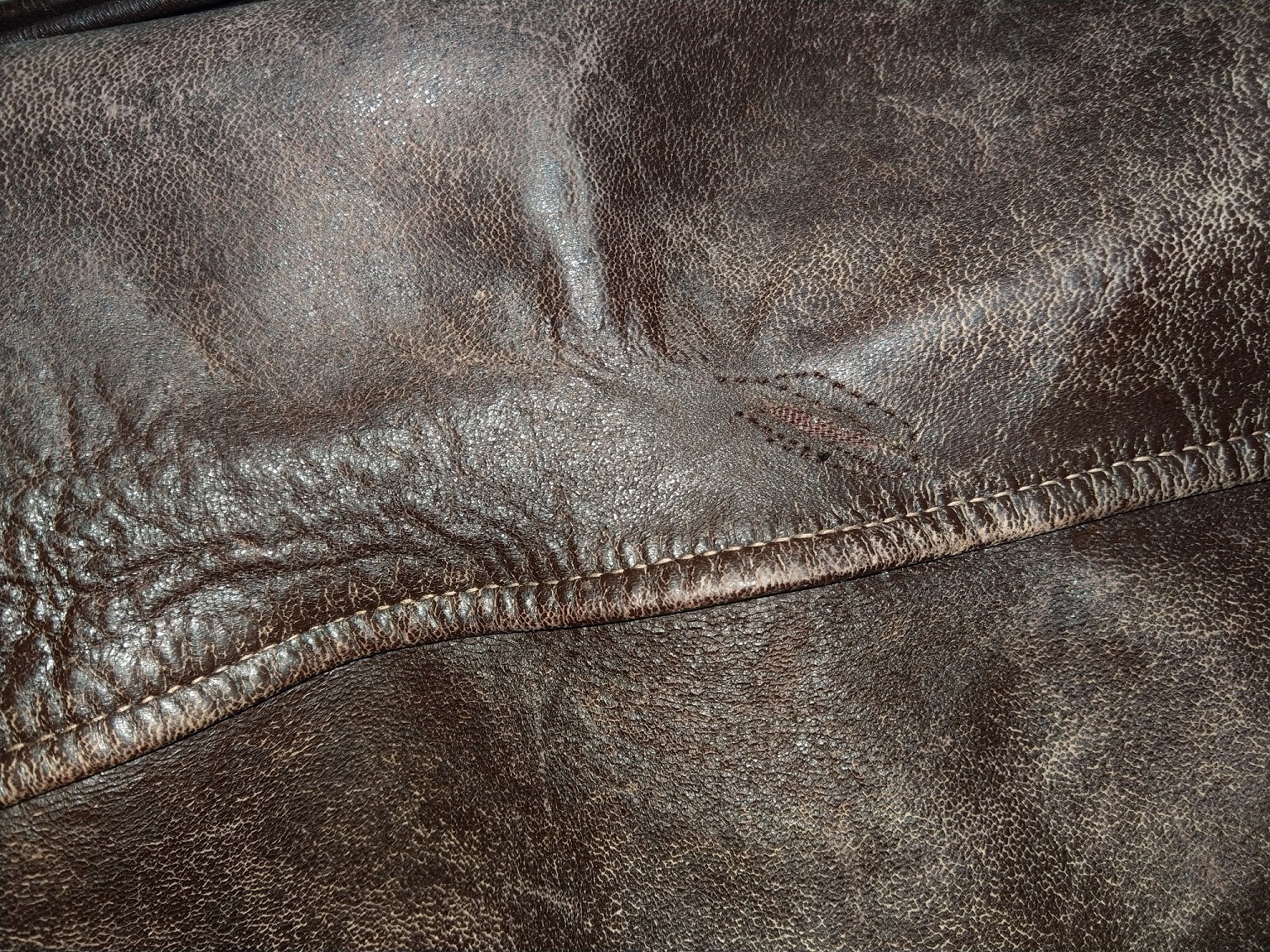 Need advice on reducing puckering on vintage leather jacket | The