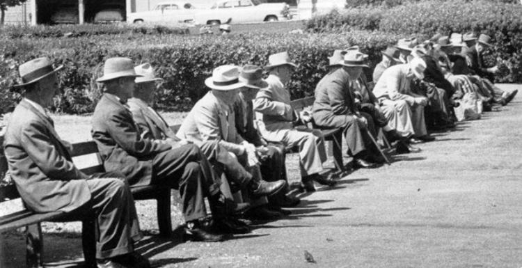 Men with hats on bench c1940.jpg