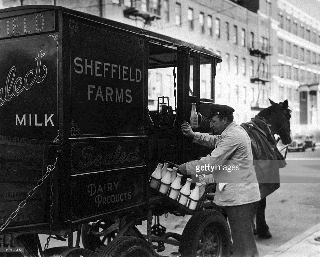 milkman-delivering-milk-from-the-sheffield-farms-milk-company-with-a-picture-id81767909.jpg