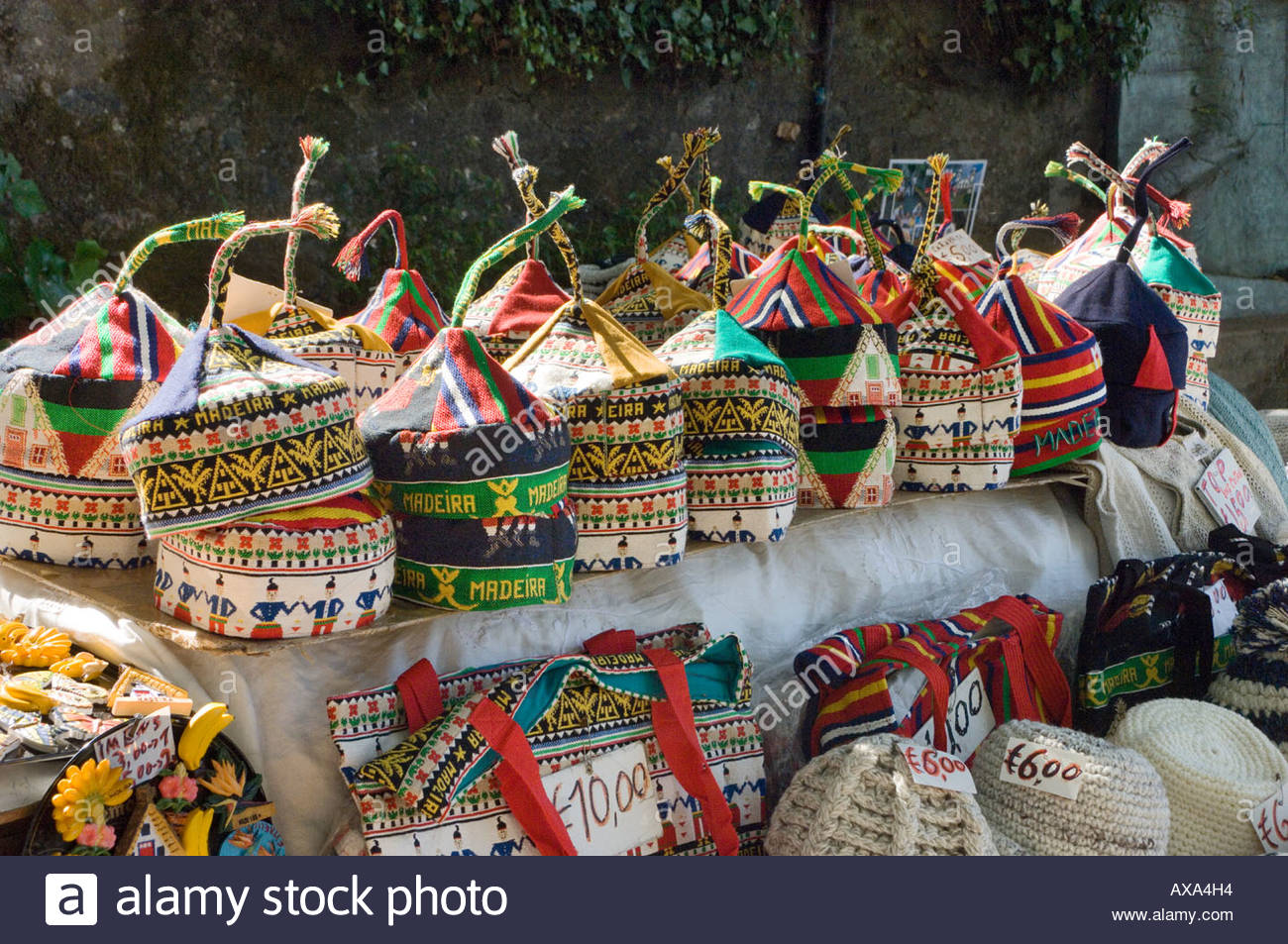 portugal-madeira-traditional-hats-on-sale-at-a-souvenir-stall-at-monte-AXA4H4.jpg