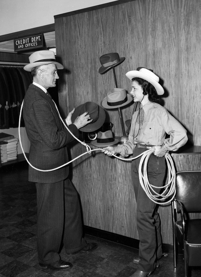roped_into_buying_hat_1942.JPG