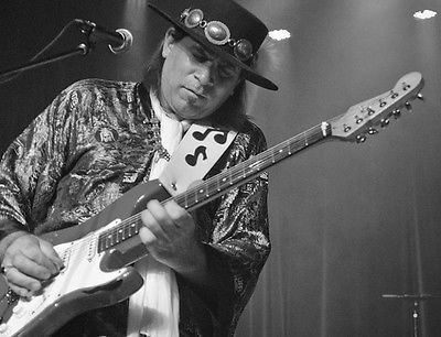 Stevie-Ray-Vaughan-Powerhouse-Guitarist-Rock-Music-8X10.jpg