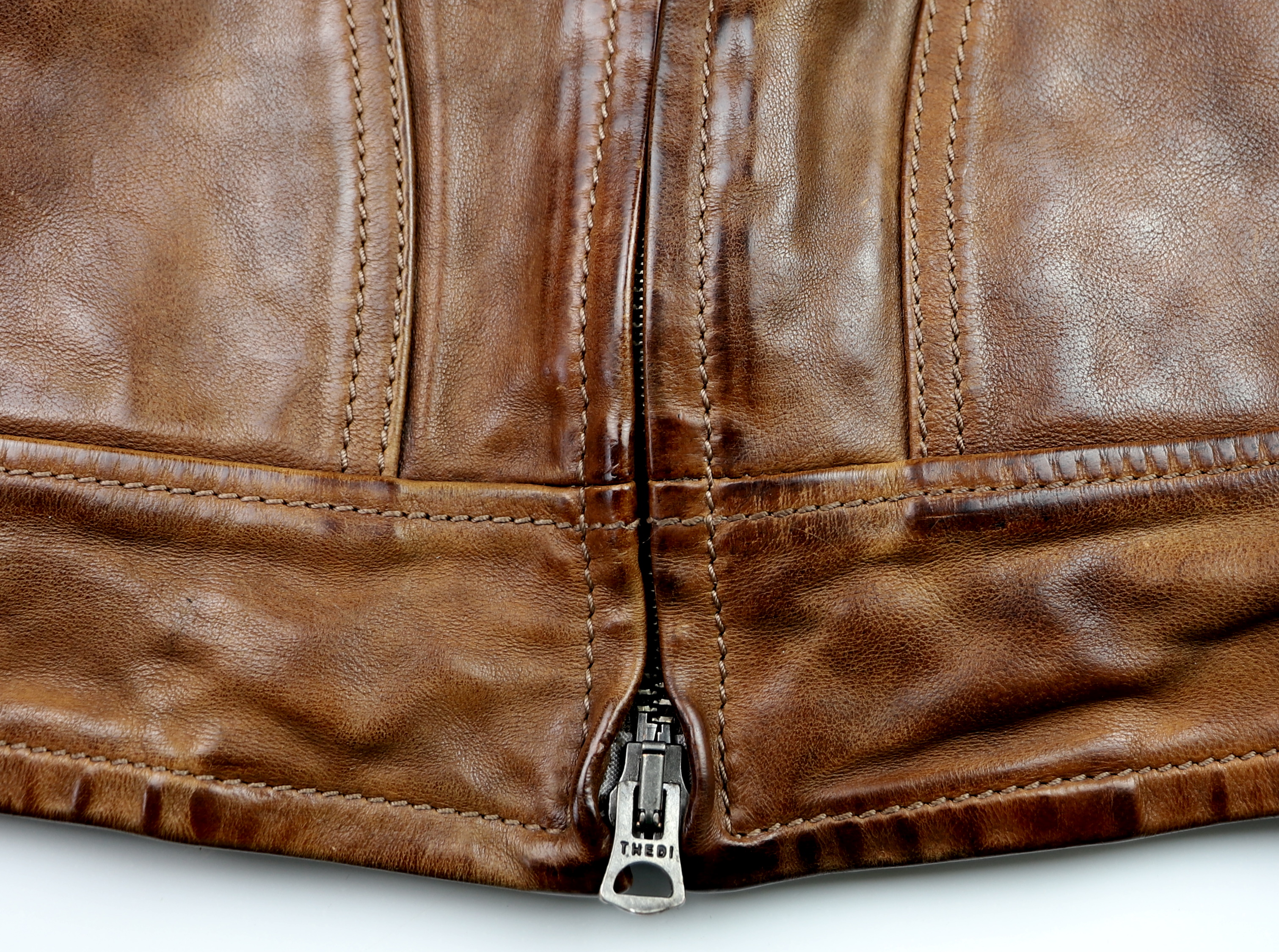 Thedi Aegean Half Belt Light Brown Buffalo L1M bottom hem.jpg