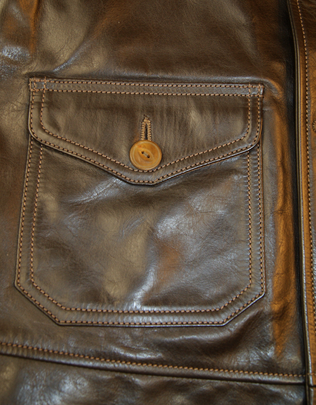 Thedi Button-Up Shawl Collar Brown Horsehide SBP patch pocket.jpg