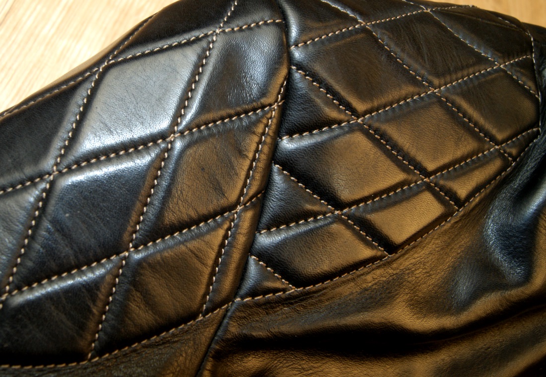 Thedi Custom Phenix Black Horsehide shoulder quilting.jpg