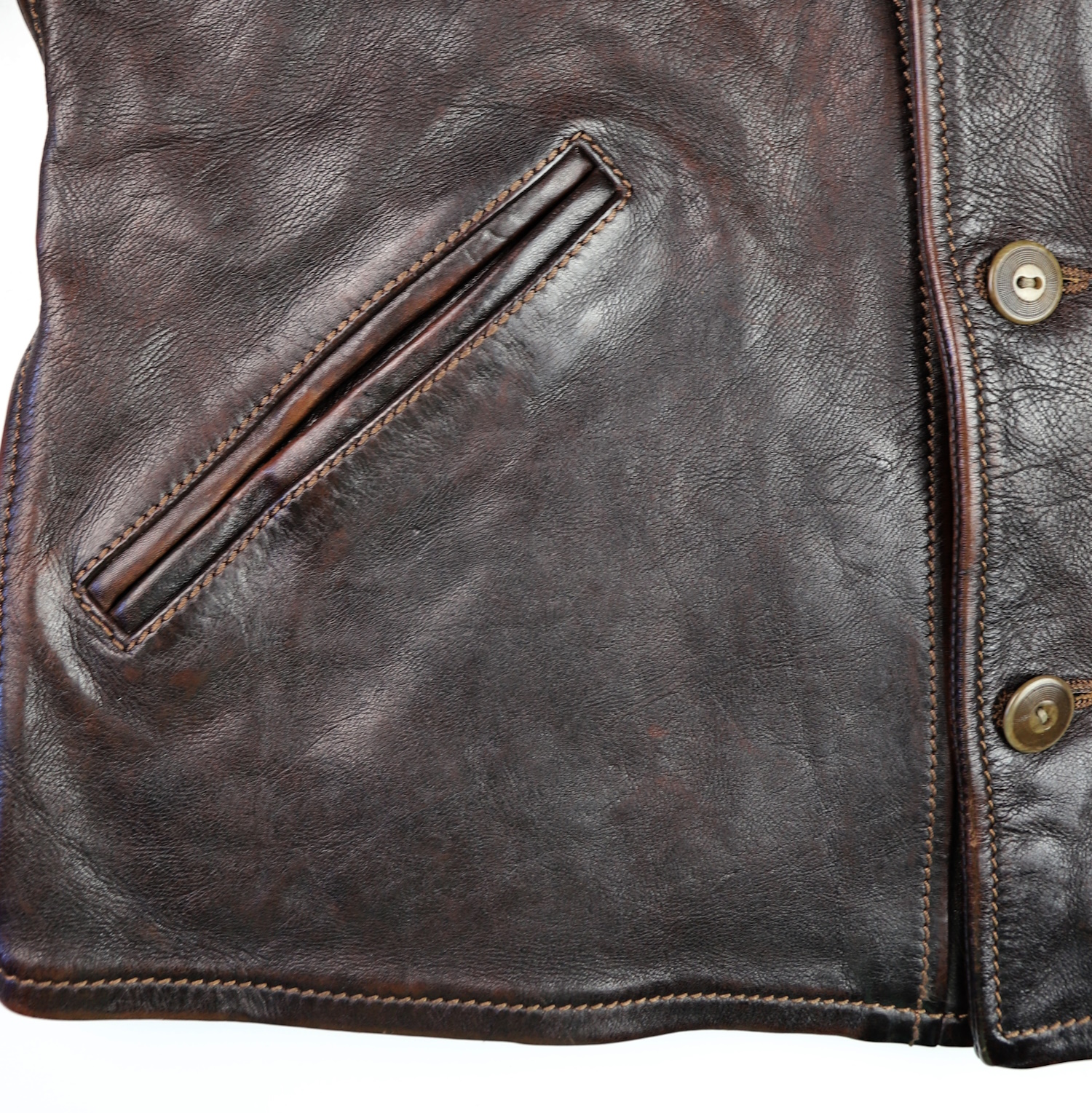 Thedi Hektor Chestnut Bruciato Horsehide handwarmer.jpg