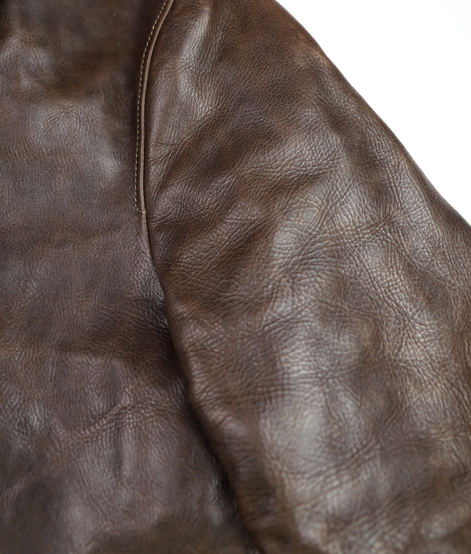 Thedi Markos Button-Up Shawl Brown Cowhide L1 sleeve grain.jpg