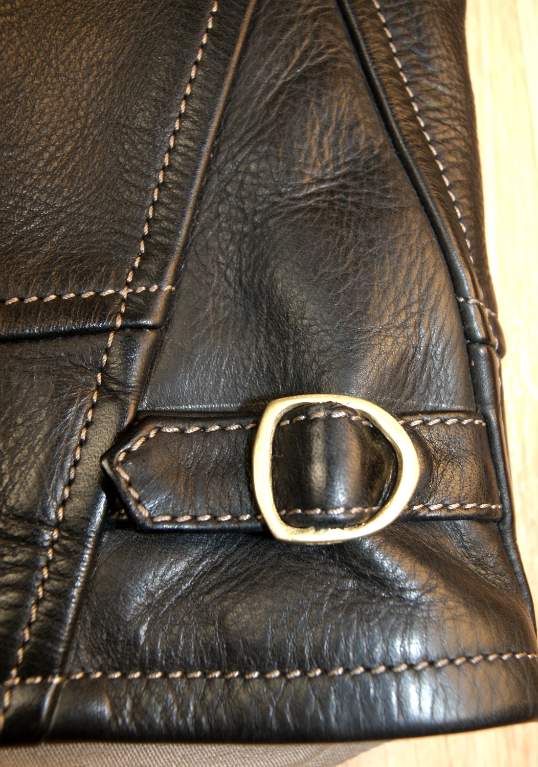 Thedi Shawl Collar Black Cowhide 2XL side strap.jpg