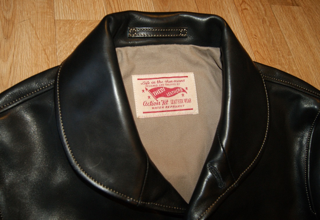 Thedi Shawl Collar Button-Up Jacket Black Cowhide tag.jpg
