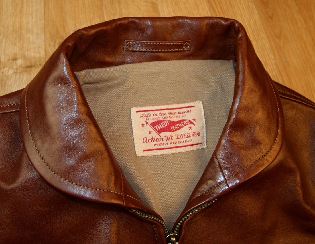 Thedi Zip-Up Shawl Collar Russet Horsehide tag.jpg