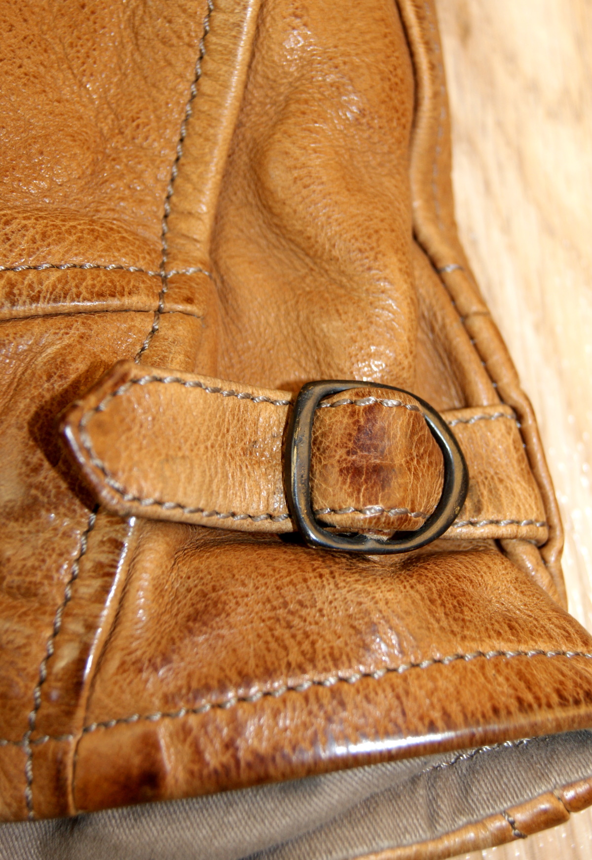 Thedi Zip-Up Shawl Collar Washed Cuoio Buffalo Medium side strap.jpg