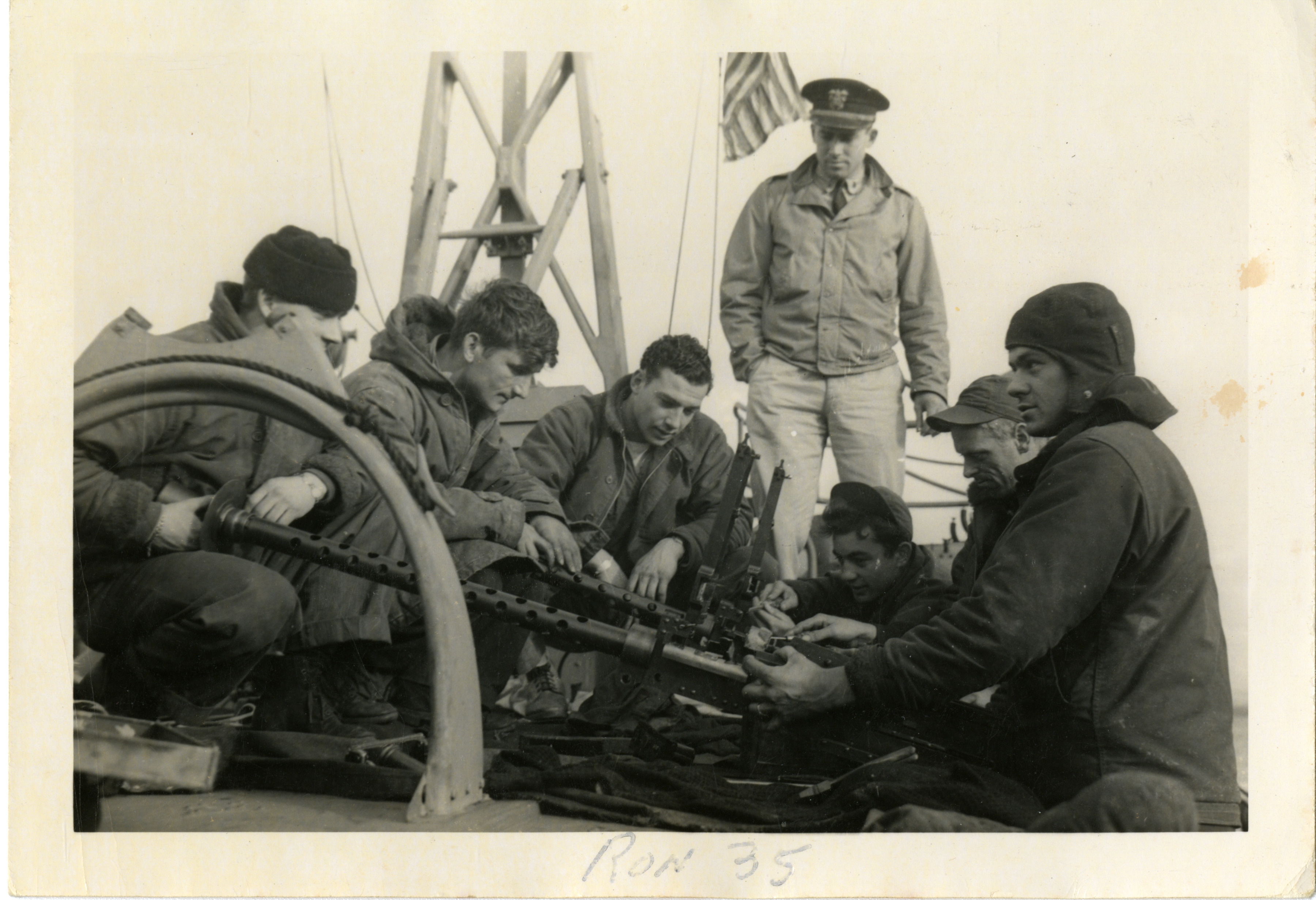 US PT Boat Crewmen maintenance on machine guns.jpg