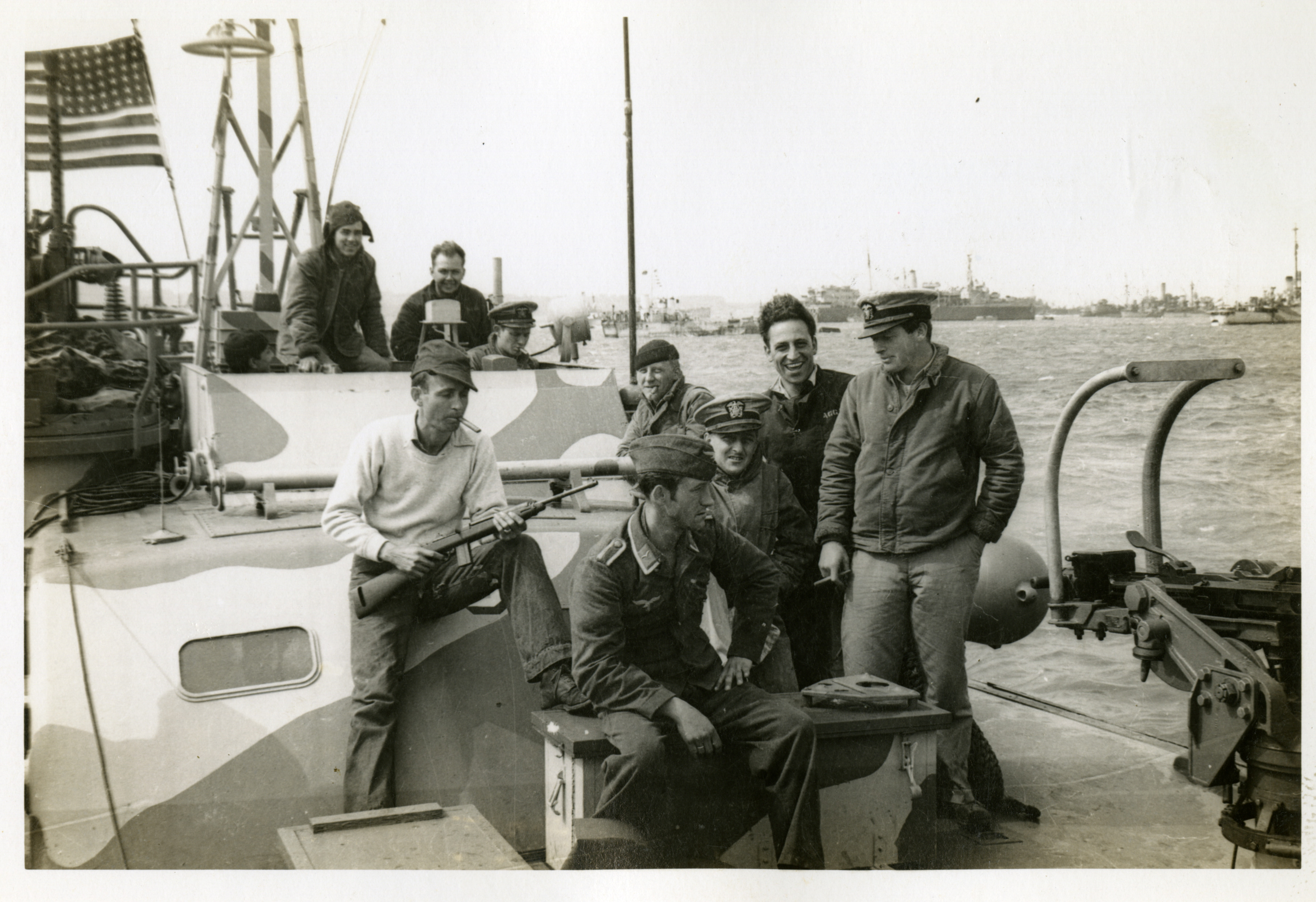 US PT Boat Crewmen with German POW.jpg