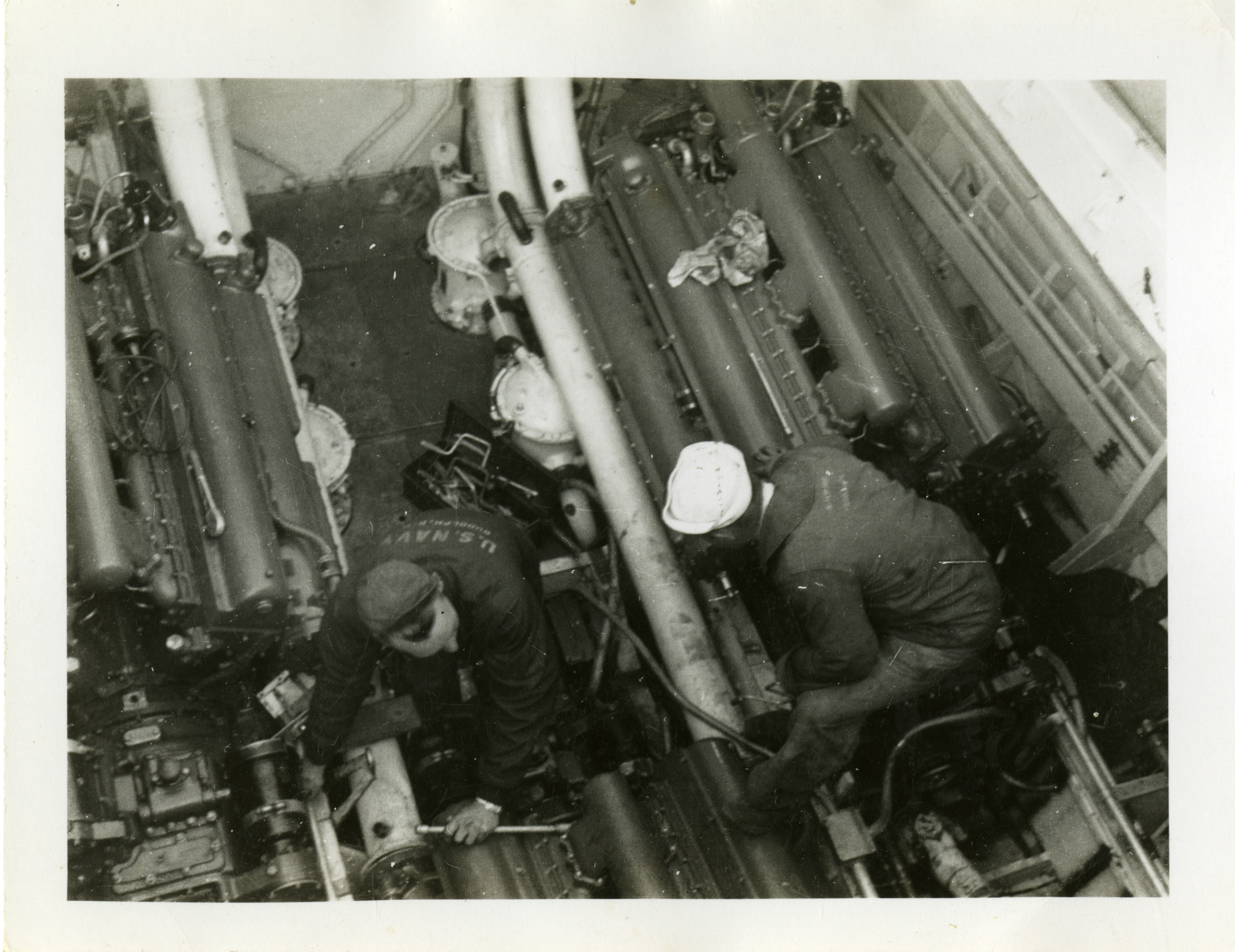 US PT Boat crewmen working on engine2.jpg