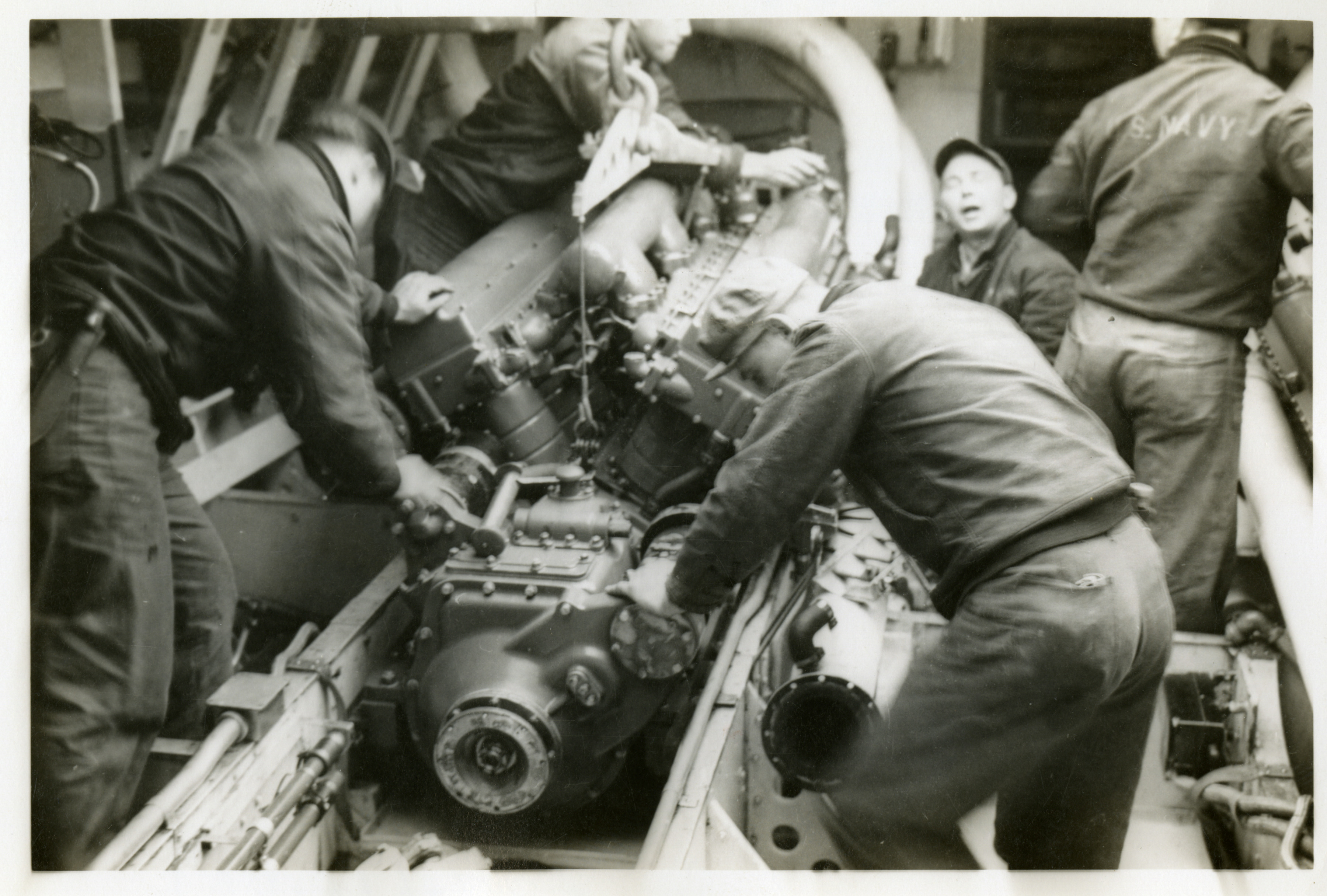 US PT Boat Crewmen working on engine3.jpg