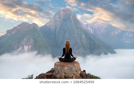 serenity-yoga-practicing-mountain-rangemeditation-260nw-1064525450.jpg